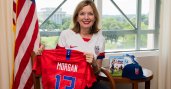 Assistant Secretary Marie Royce and Alex Morgan shirt