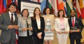 Spring 2014 Alumni Impact Award winners (L-R) Ahmadhon Yusupkhanov, Germaine White, Nadia Rabaa, Rachel Havrelock, and Lavell Kirby pose with ECA Assistant Secretary of State Evan Ryan (third from left).