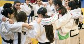 Girls huddle together